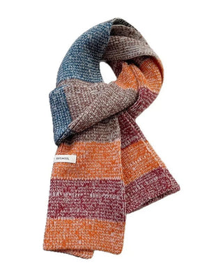 Textured wool color block scarf with blue, brown, orange, and burgundy stripes.
