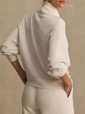 Black sweatshirt and wide-leg pants set with full-length and quarter-zip