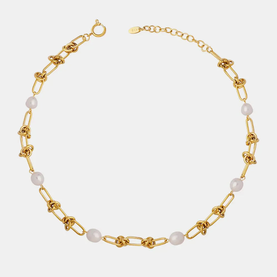 Gold linked pearl knot collar necklace with toggle clasp