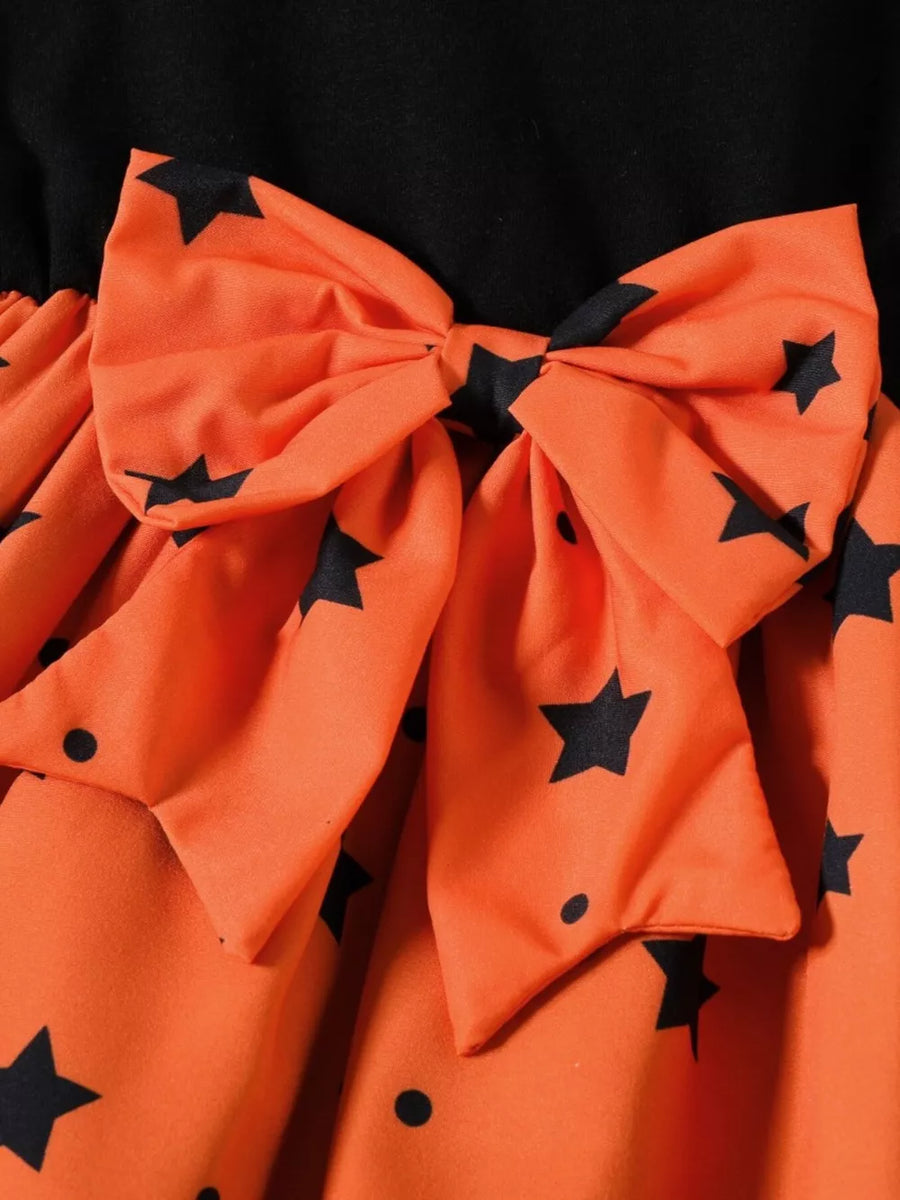 orange fit-and-flare dress featuring layered and star-print
