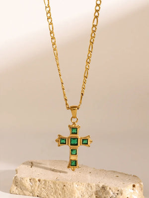 Gold cross pendant necklace with green zirconia stones