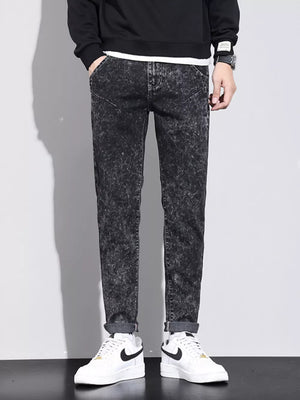 jeans in charcoal featuring pocketed and slim fit