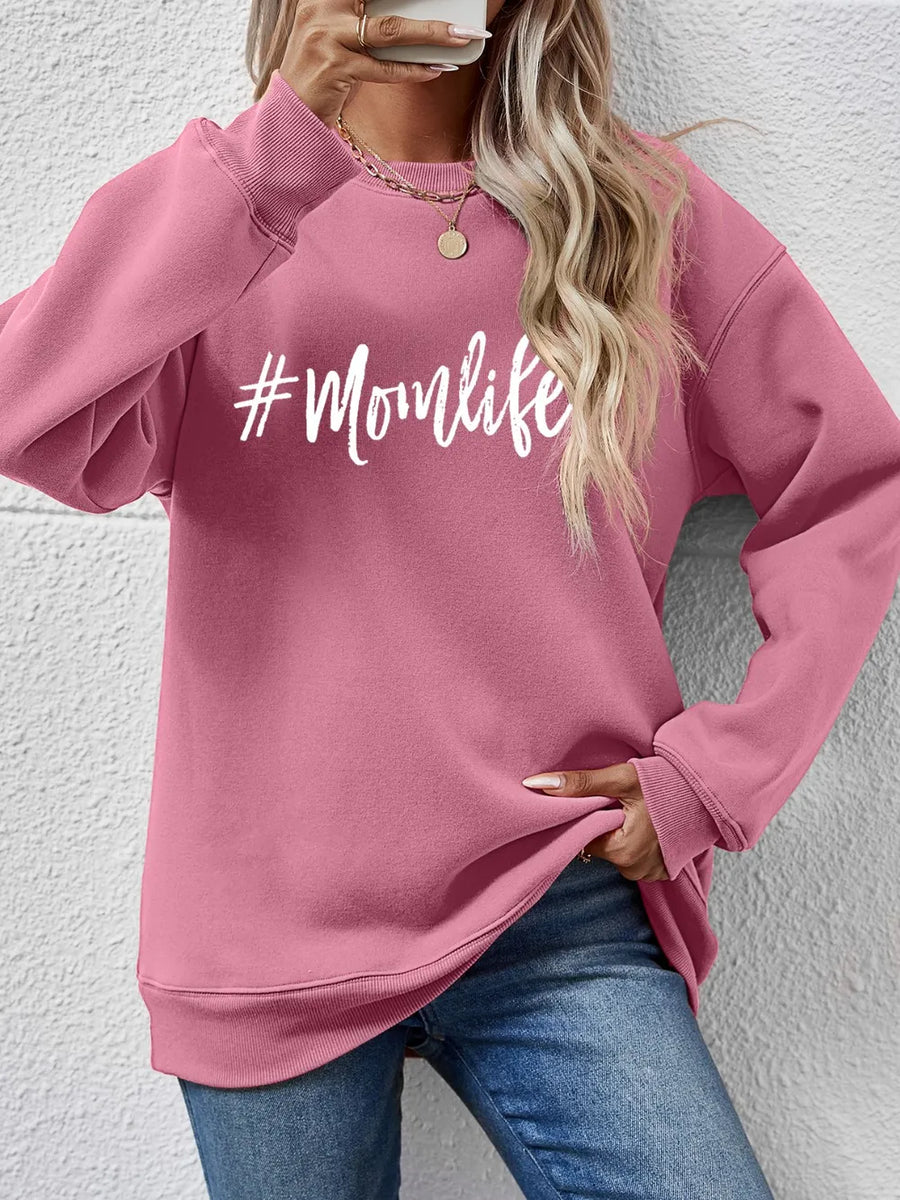 Momlife Crewneck Sweatshirt in Blush Pink with white graphic text