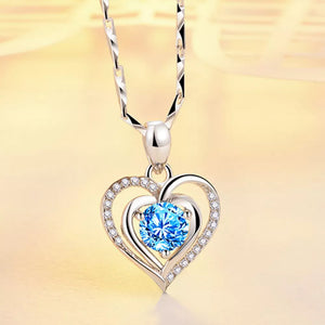 necklace in silver featuring heart pendant and pendant fit