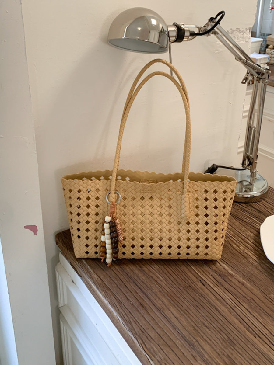 Green shoulder bag with open-top and woven