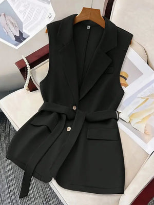 Black belted sleeveless blazer with lapels