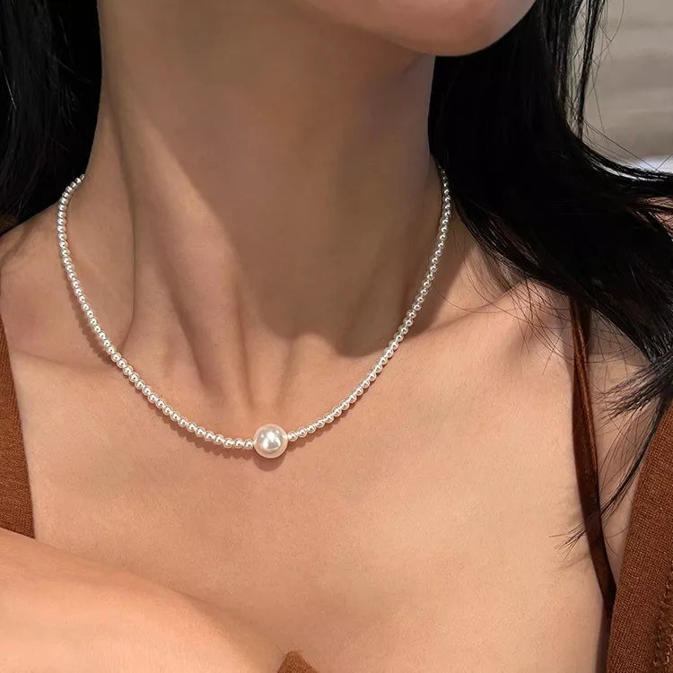 Synthetic Pearl Care instructions: 1 choker necklace in White with fitted silhouette