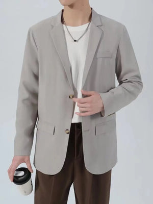 Men's light gray classic fit sport jacket with two button closure and flap pockets.