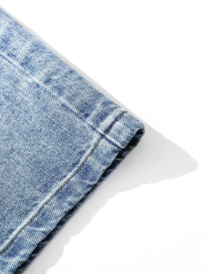 Light blue denim capris with relaxed fit and visible stitching detail.