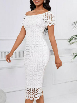White lace midi dress with off-the-shoulder neckline and short puff sleeves.