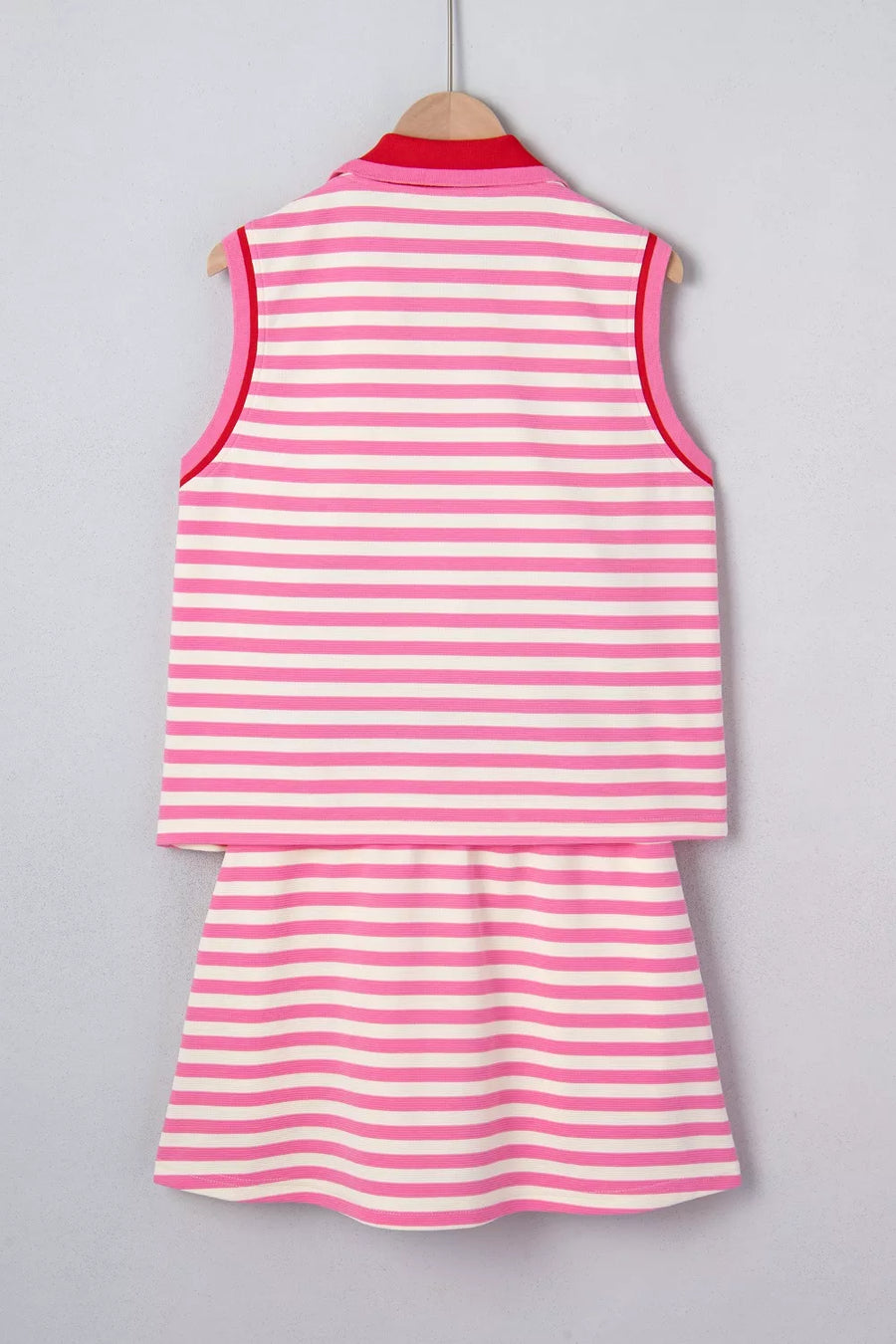Pink and white striped cotton two-piece set with red trim and collar detail.