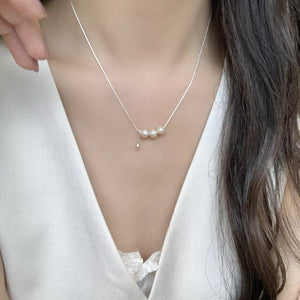 ACCESSORIES in cream with pearl accents and collar length