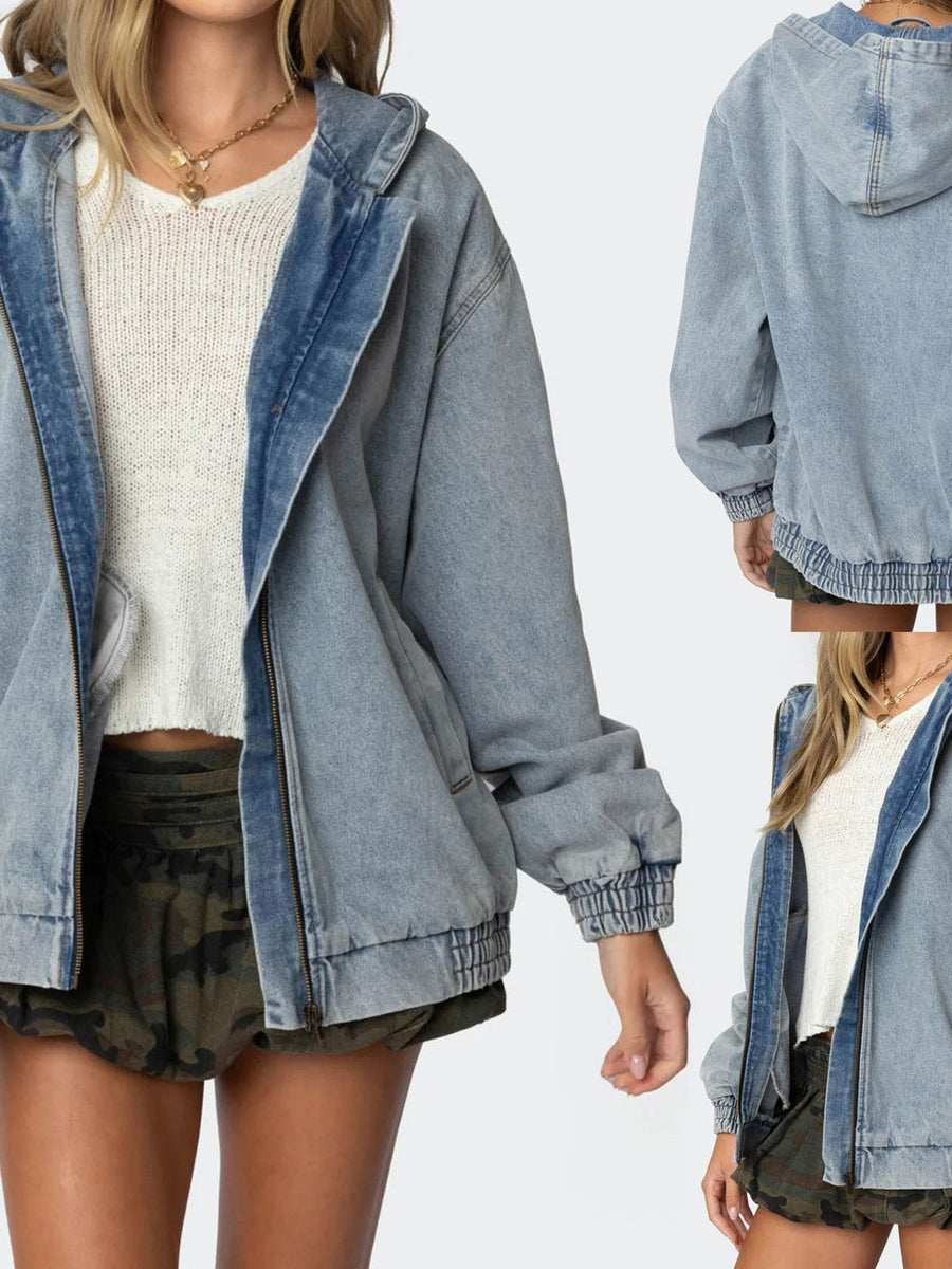 Light wash denim hooded jacket with elastic cuffs and hem, styled open over a white top.