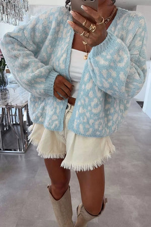 100% acrylic Care instructions: Machine wash cold cardigan in Light Blue with oversized silhouette