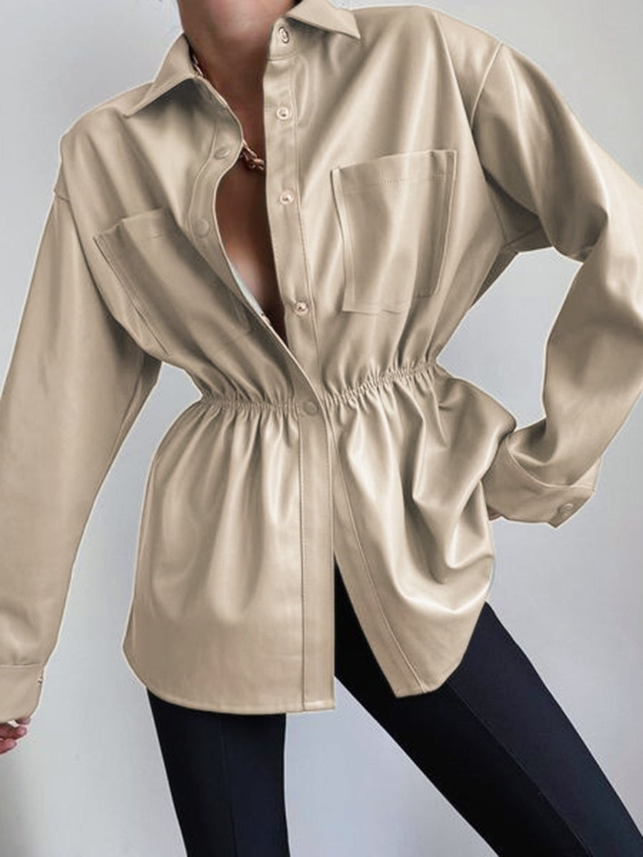 Tan faux leather shirt jacket with gathered waist and chest pockets