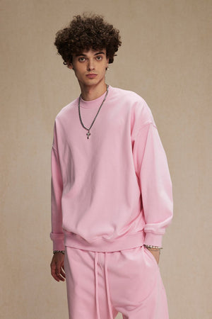 Pink crewneck sweatshirt with long sleeves