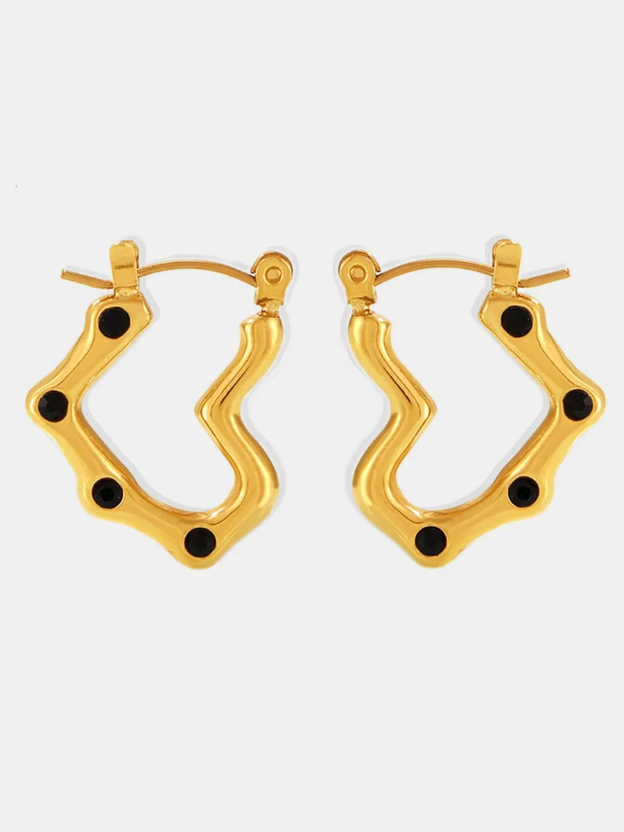 Gold wave hoop earrings with black accents