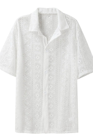 White crochet resort shirt with geometric pattern, short sleeves, and button-up front.