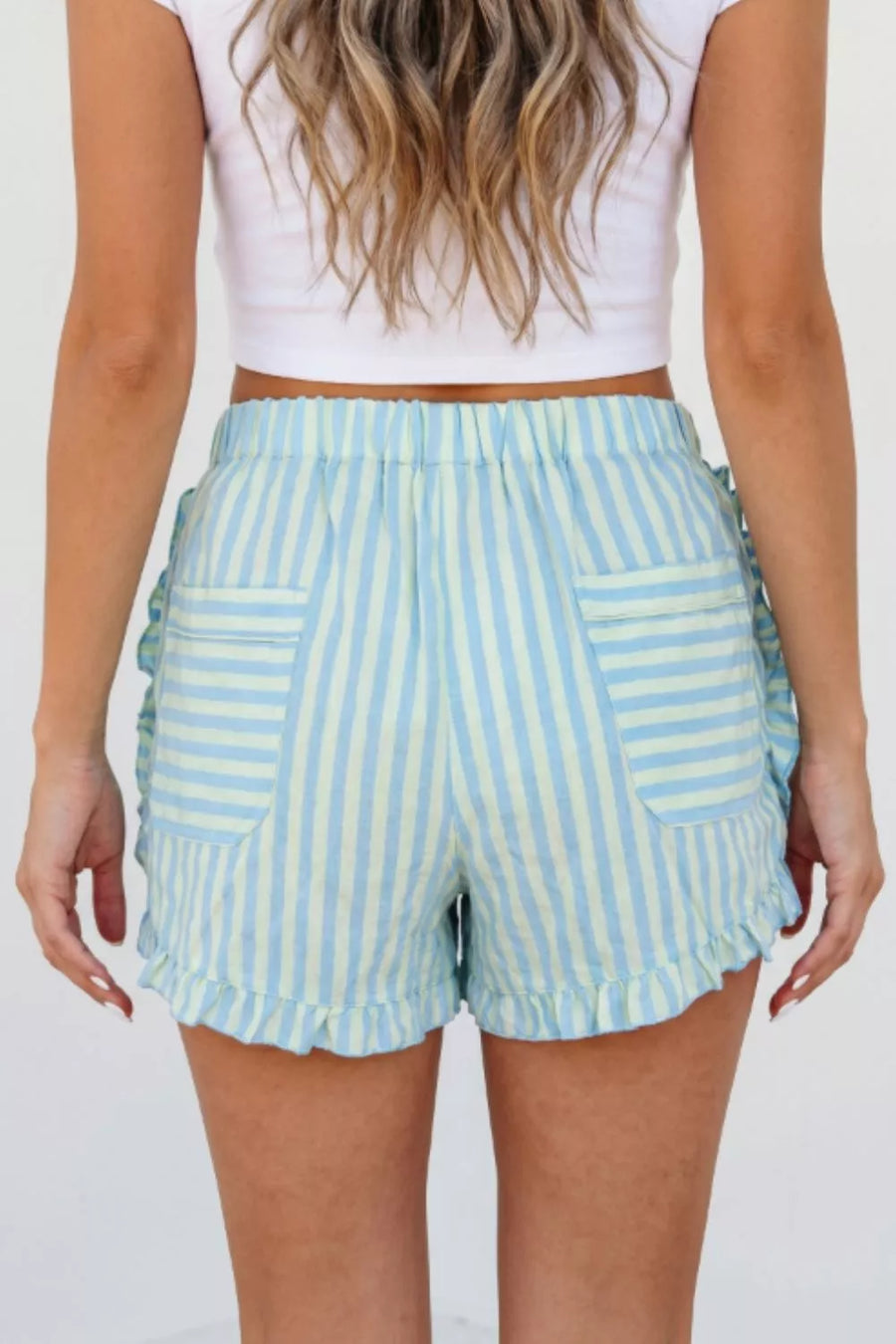 Ruffled striped cotton shorts with pockets and elastic waist.