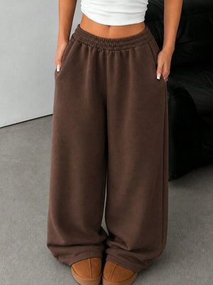 50% viscose, 50% polyester Care instructions: Machine wash cold sweatpants in Black with wide-leg silhouette