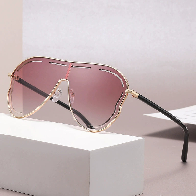 Statement aviator gradient sunglasses with gold metal frames and dusty pink lenses