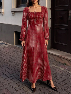 Red maxi dress featuring tied and polka dot