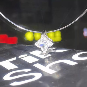 necklace in clear with star and star pendant