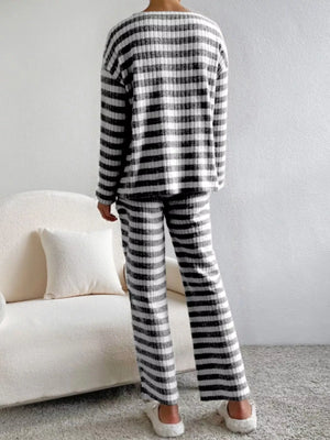 Black striped knit loungewear set with long sleeves and pants.