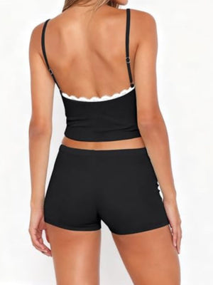 Black lace-trimmed cami and shorts set with adjustable straps