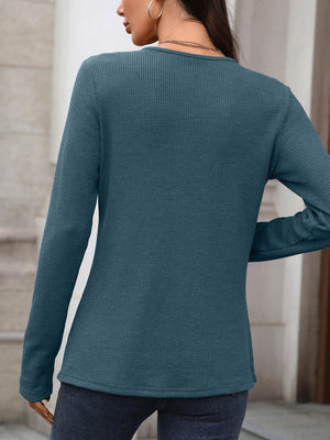 Blue Gray waffle knit long sleeve t-shirt with a crew neck.