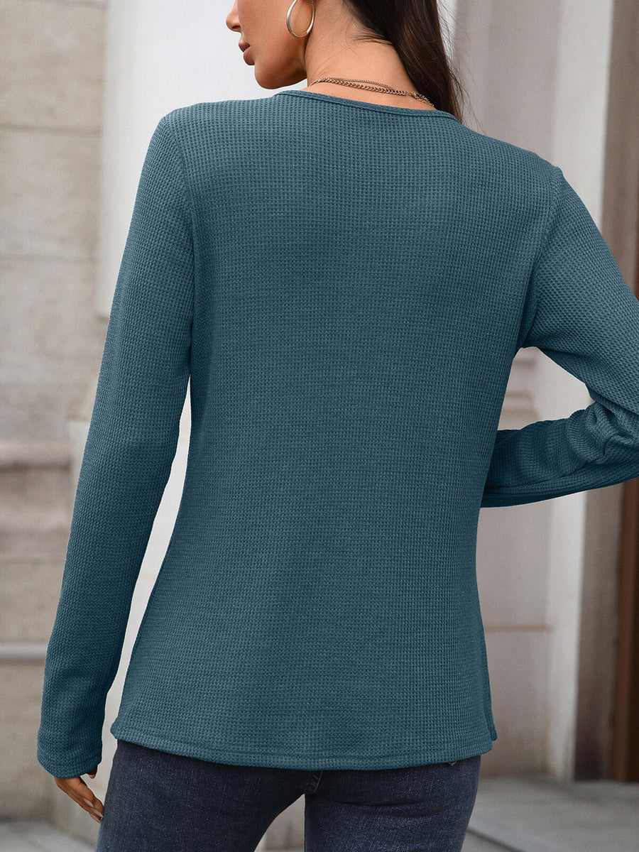 Blue Gray waffle knit long sleeve t-shirt with a crew neck.