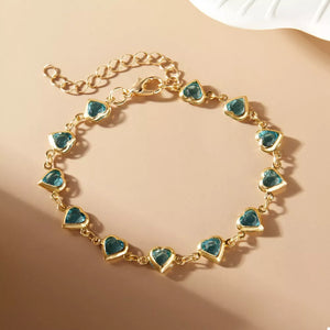 bracelet in gold featuring adjustable length and linked chain fit