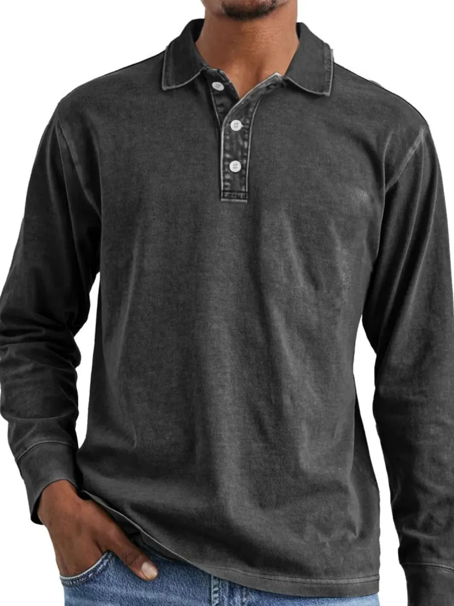 Vintage wash long sleeve polo shirt in dark gray with button placket and collar.