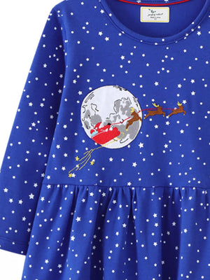 Children's royal blue long-sleeve dress with scattered stars and a Santa sleigh on the moon graphic.