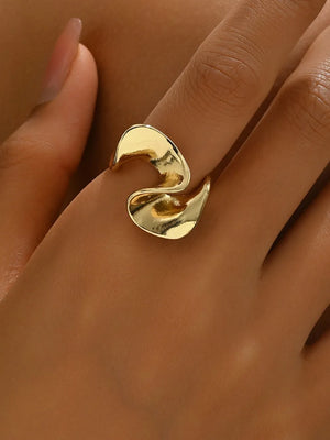 Gold ring featuring open-ended and geometric