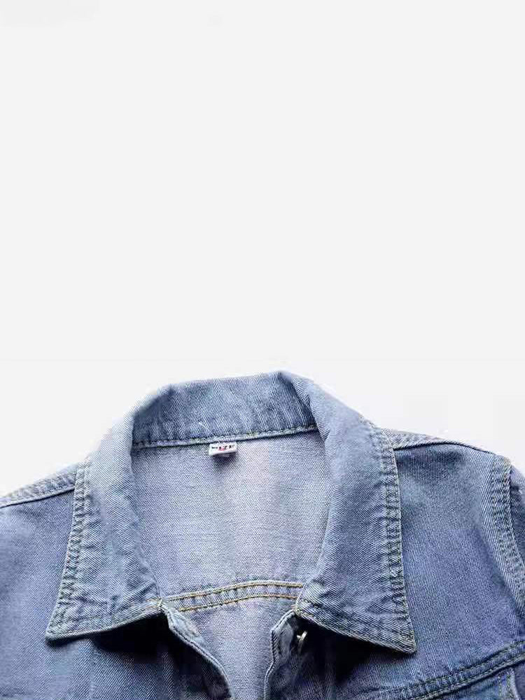 denim jacket in medium wash denim blue with washed and hip-length