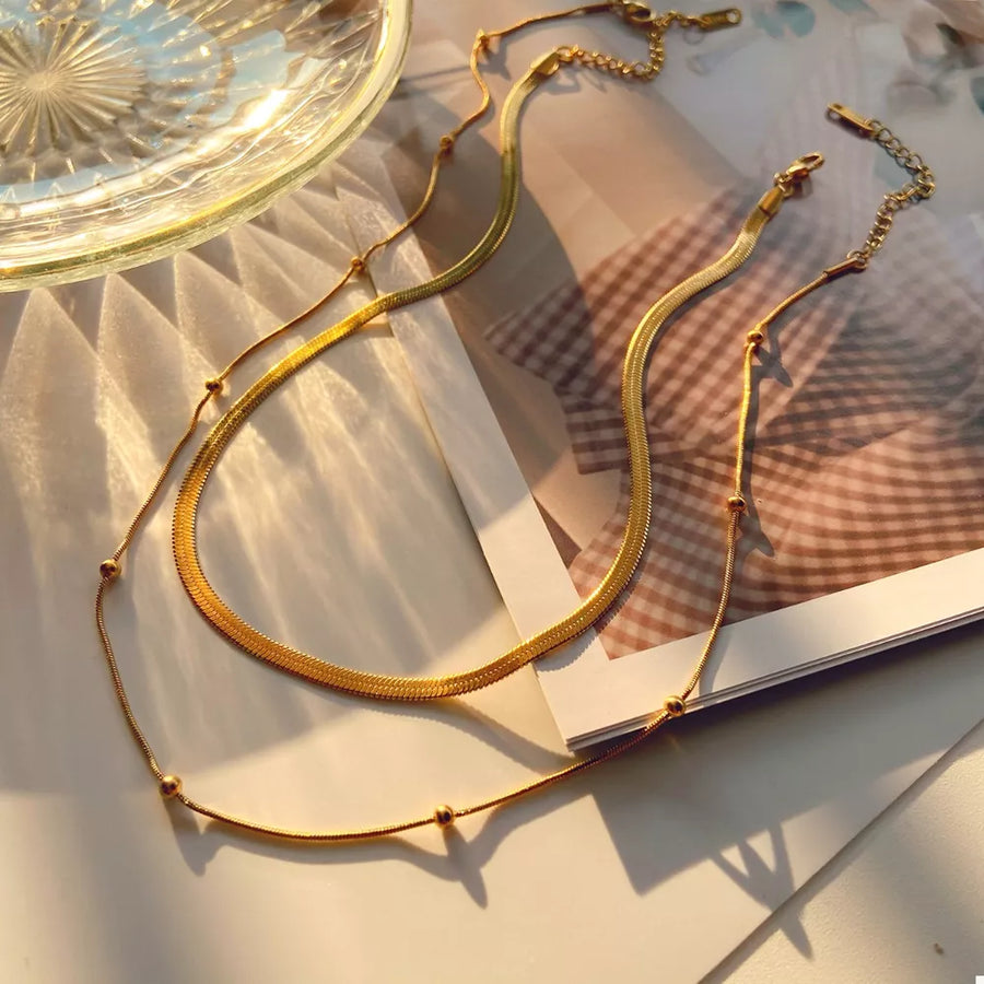 gold necklace with layered and clasp