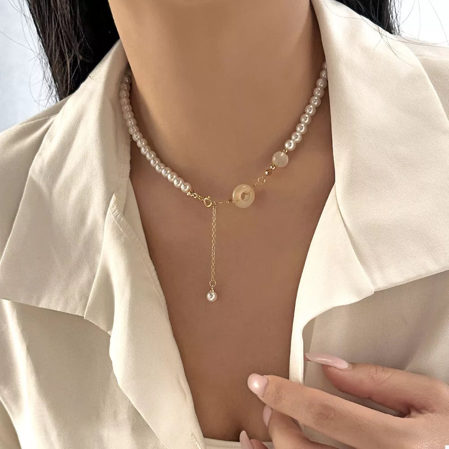 Synthetic Pearl,18K Gold-Plated,Resin,Zinc alloy Care instructions: Avoid wearin necklace in gold with fitted silhouette