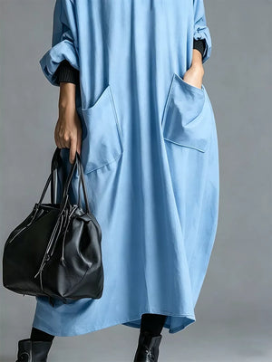 95% polyester, 5% spandex Care instructions: Machine wash cold midi dress in Orange-red with oversized silhouette