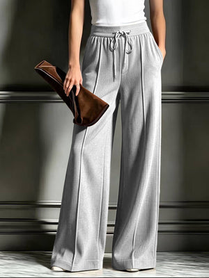 100% polyester Care instructions: Machine wash cold wide-leg pants in Light Gray with flared silhouette