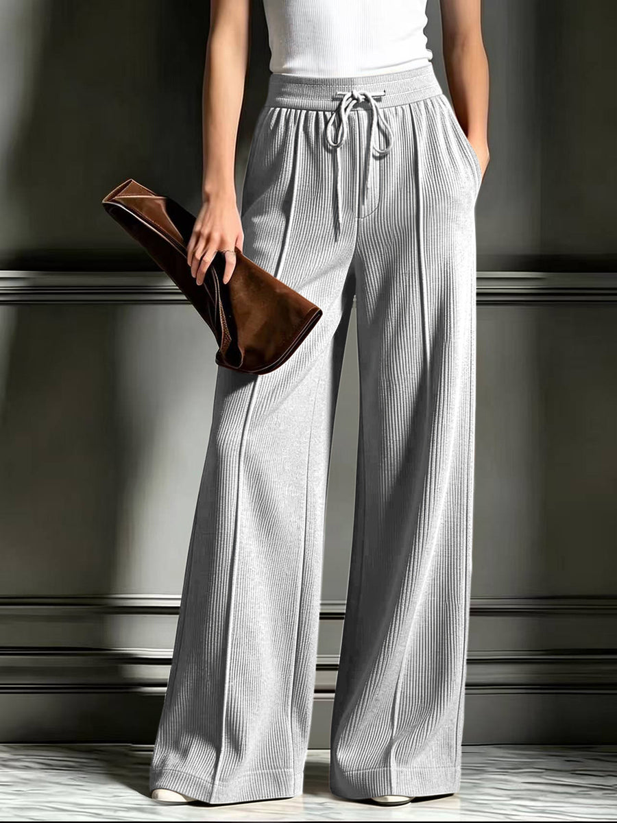 100% polyester Care instructions: Machine wash cold wide-leg pants in Light Gray with flared silhouette