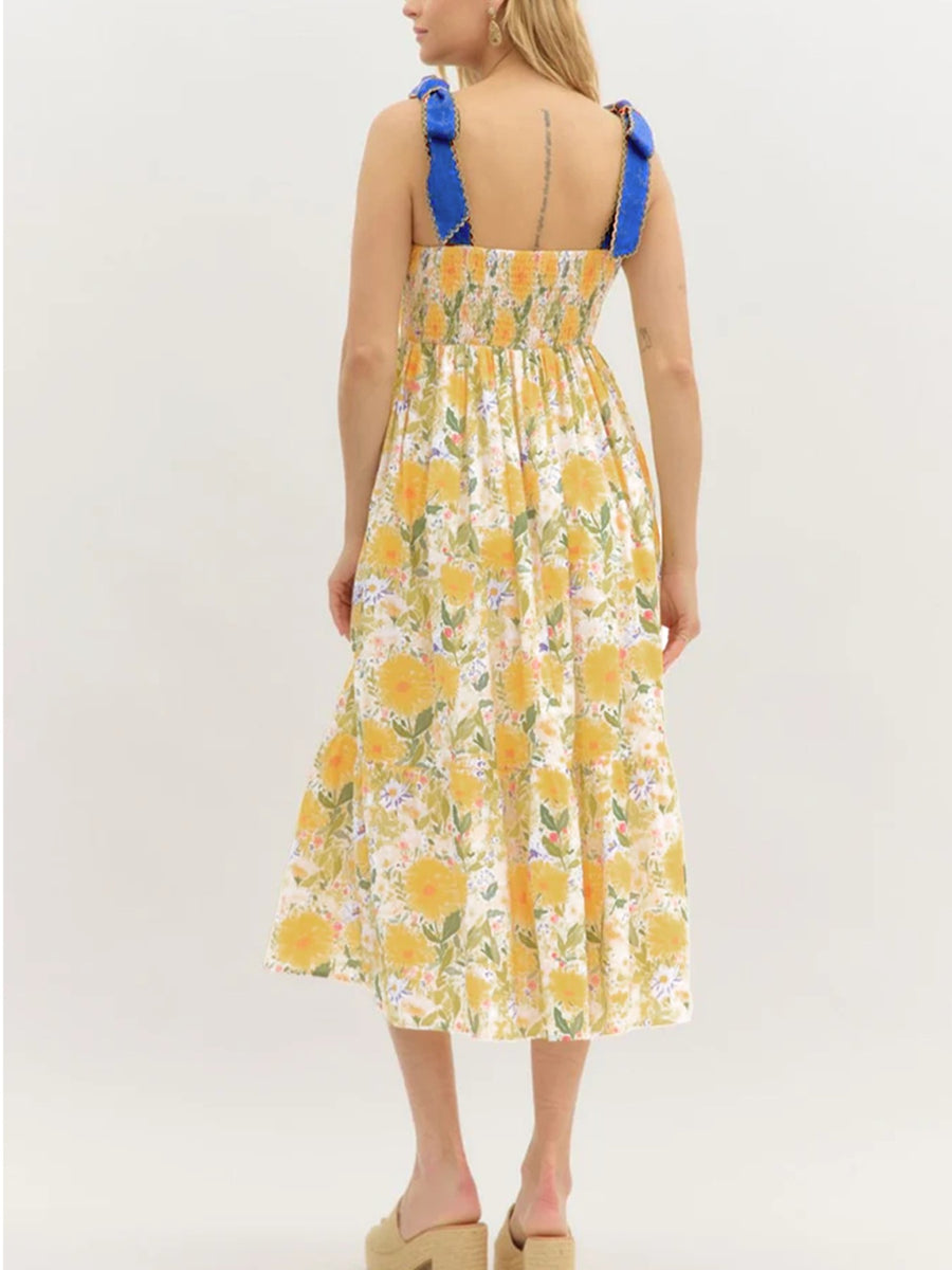 Floral midi dress with smocked bodice and blue tie shoulders