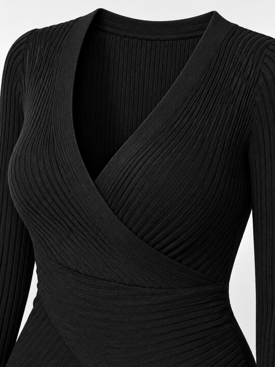 Polyester content is at least 90% and less than 95% wrap top in Blue with fitted silhouette