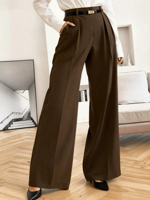 High-waisted brown pleated wide leg maternity trousers with a belt.