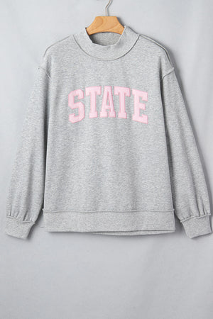 light gray sweatshirt with hip-length and pullover
