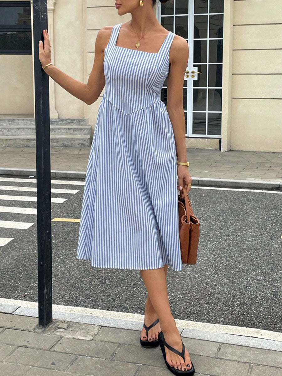 Blue and white striped midi dress with square neckline and a-line skirt.