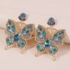 18K Gold-Plated,Alloy,Rhinestone Care instructions: Avoid wearing during exercis earrings in sapphire blue with dangle
