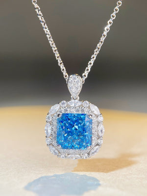 sky blue necklace featuring pendant and geometric