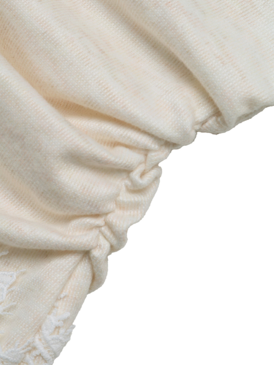 Cream ruched knit fabric with lace trim