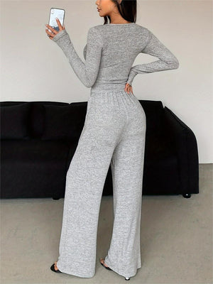 Black fitted top, wide-leg pants two-piece set with henley